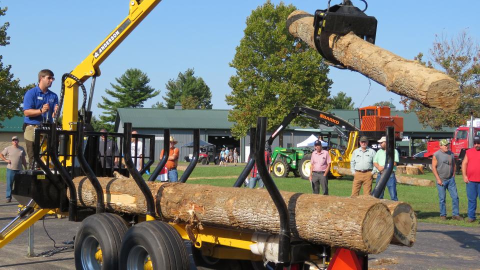 Photo of Chad Niman demonstrating small-scale logging.